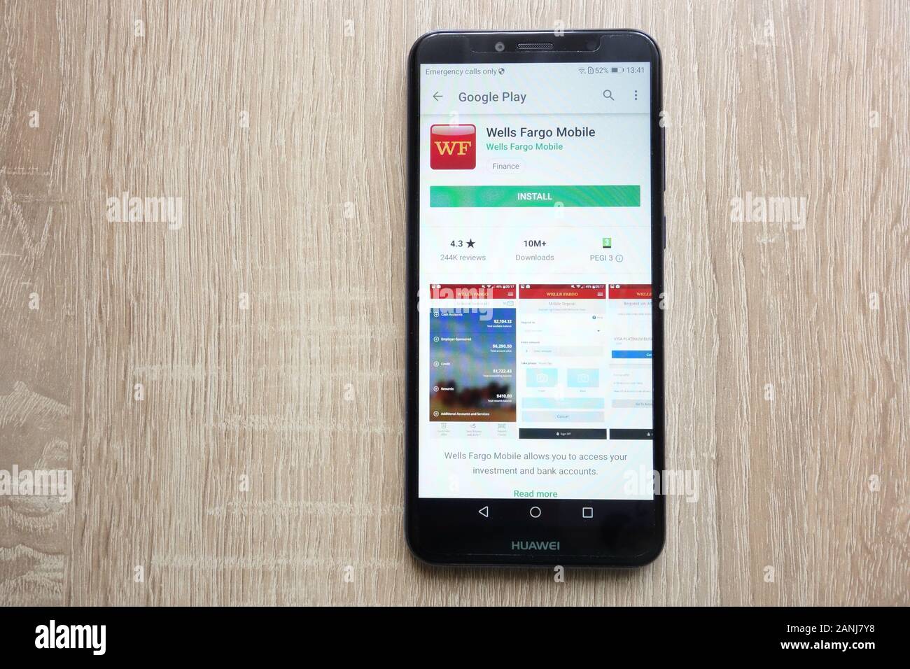 Wells Fargo Mobile app on Google Play Store website displayed on Huawei Y6 2018 smartphone Stock Photo