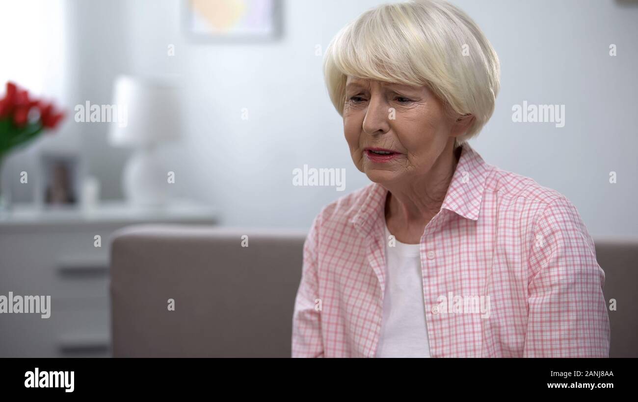 Terminally ill senior lady suffering depression, fatal disease health problems Stock Photo