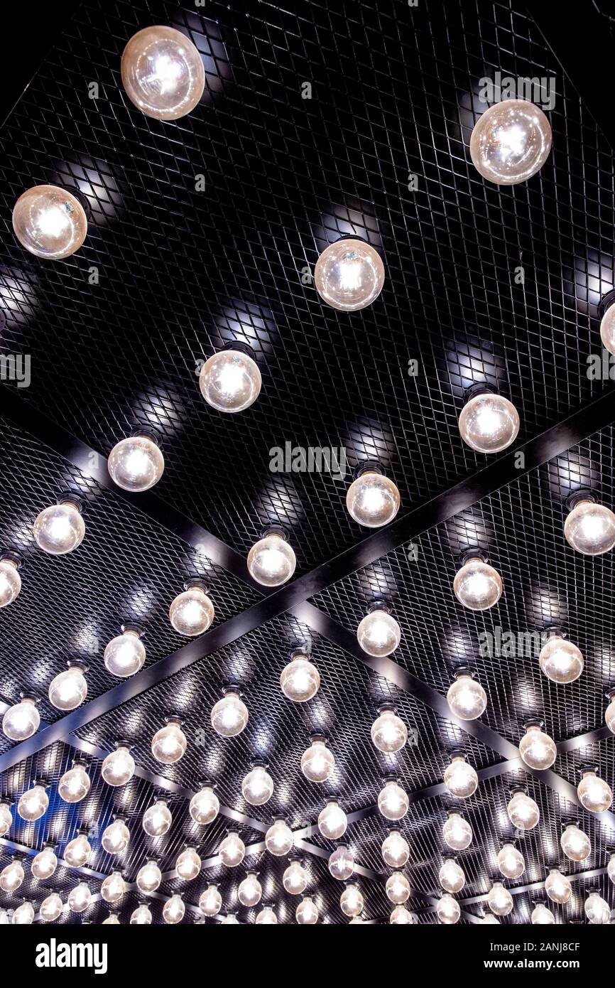 Round lights on the ceiling of the room. Stock Photo