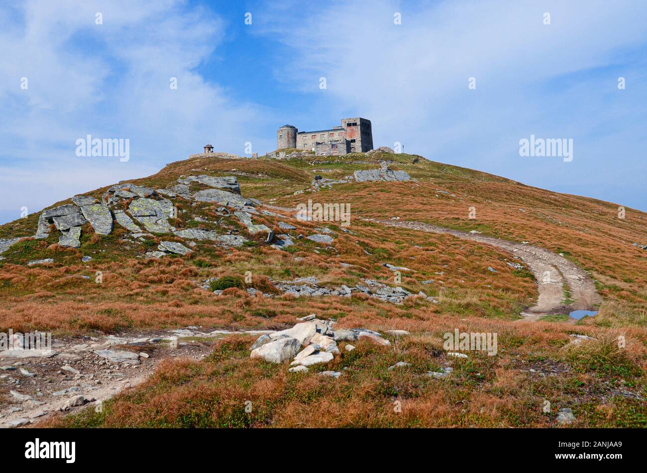 The old stone observatory stands on peak of the Carpathian Mountains Stock Photo