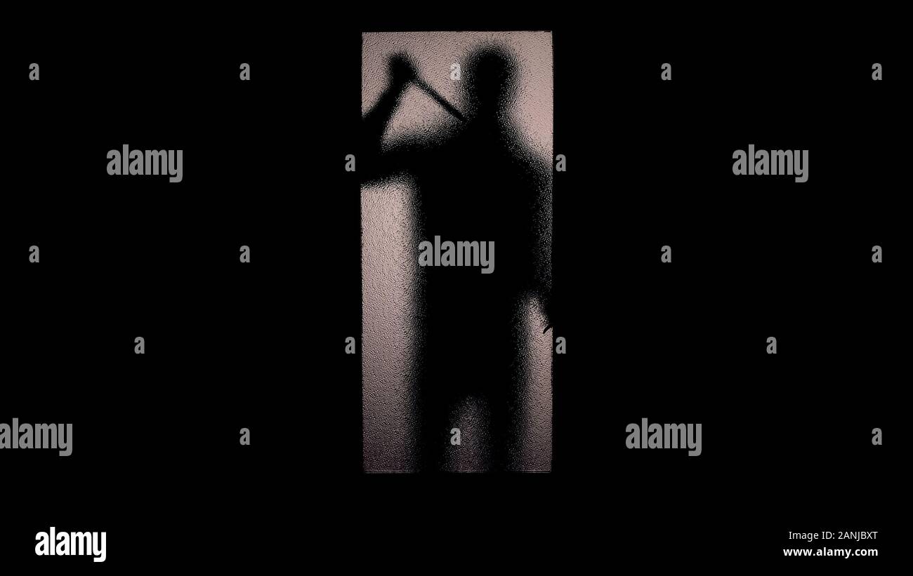 Fearful silhouette of man with knife standing near glass door maniac