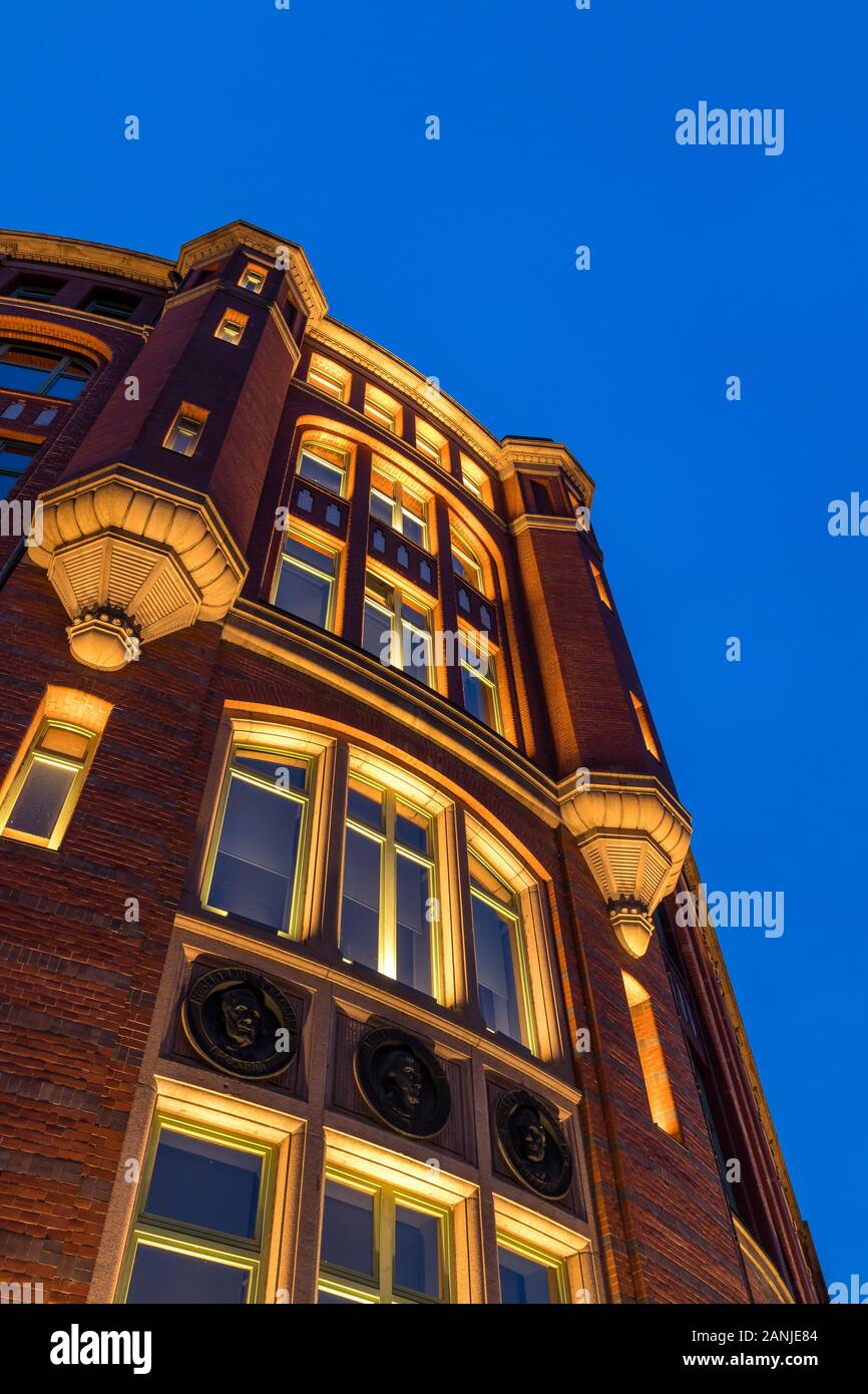 Illuminated Kontorhaus building 'Slomanhaus' at dusk, Hamburg, Germany, Europe Stock Photo