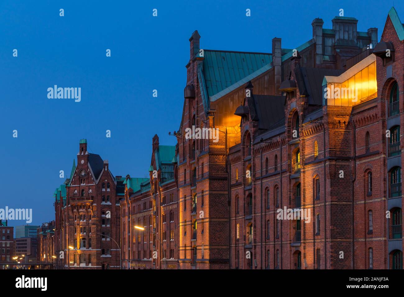 Illuminated buildings of the historical warehouse complex, UNESCO World Heritage Site, Hamburg, Germany, Europe Stock Photo