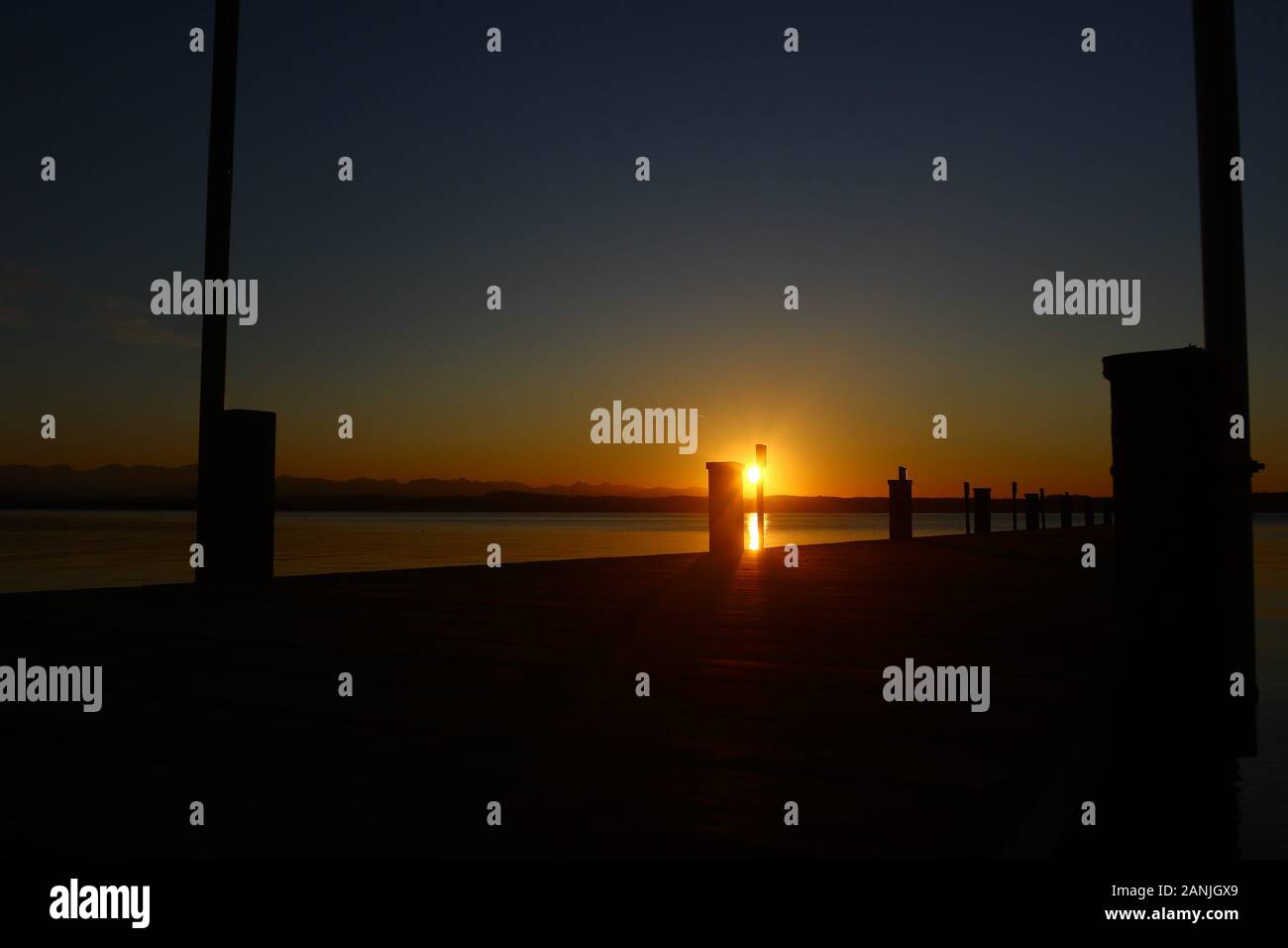 Ambach, Germany January 2020: Impressions Ambach - recreation area - January 2020 sunset in Ambach (Lkr.Bad Toelz/Wolfratshausen) on Lake Starnberg, recreation area and bathing area | usage worldwide Stock Photo