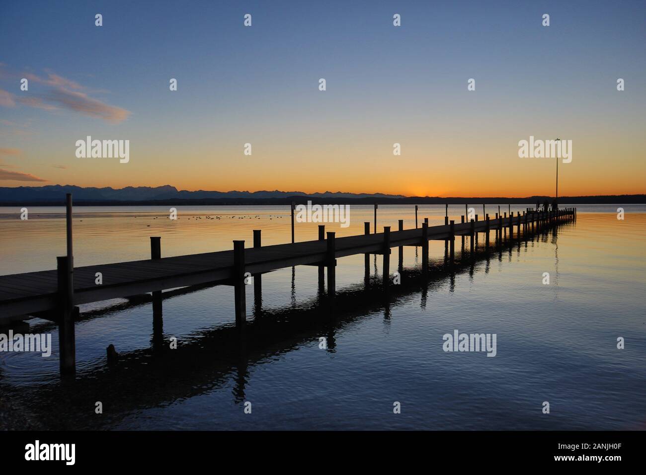 Ambach, Germany January 2020: Impressions Ambach - recreation area - January 2020 sunset in Ambach (Lkr.Bad Toelz/Wolfratshausen) on Lake Starnberg, recreation area and bathing area | usage worldwide Stock Photo