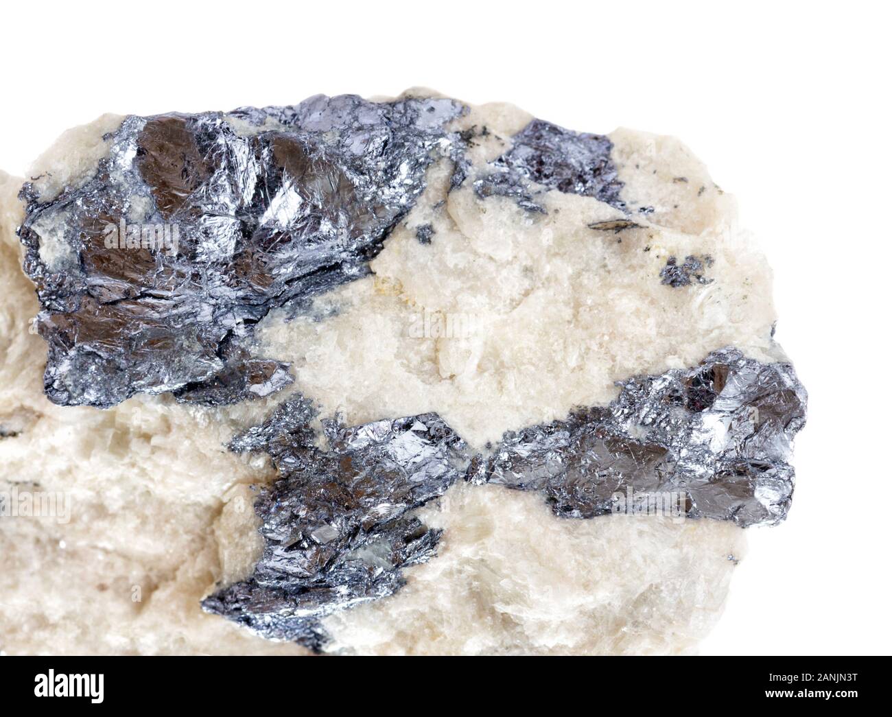 Molybdenite inclusions in quartz isolated on a white background; Molybdenite is ore of mineral resources Molybdenium; macro shooting, collection speci Stock Photo