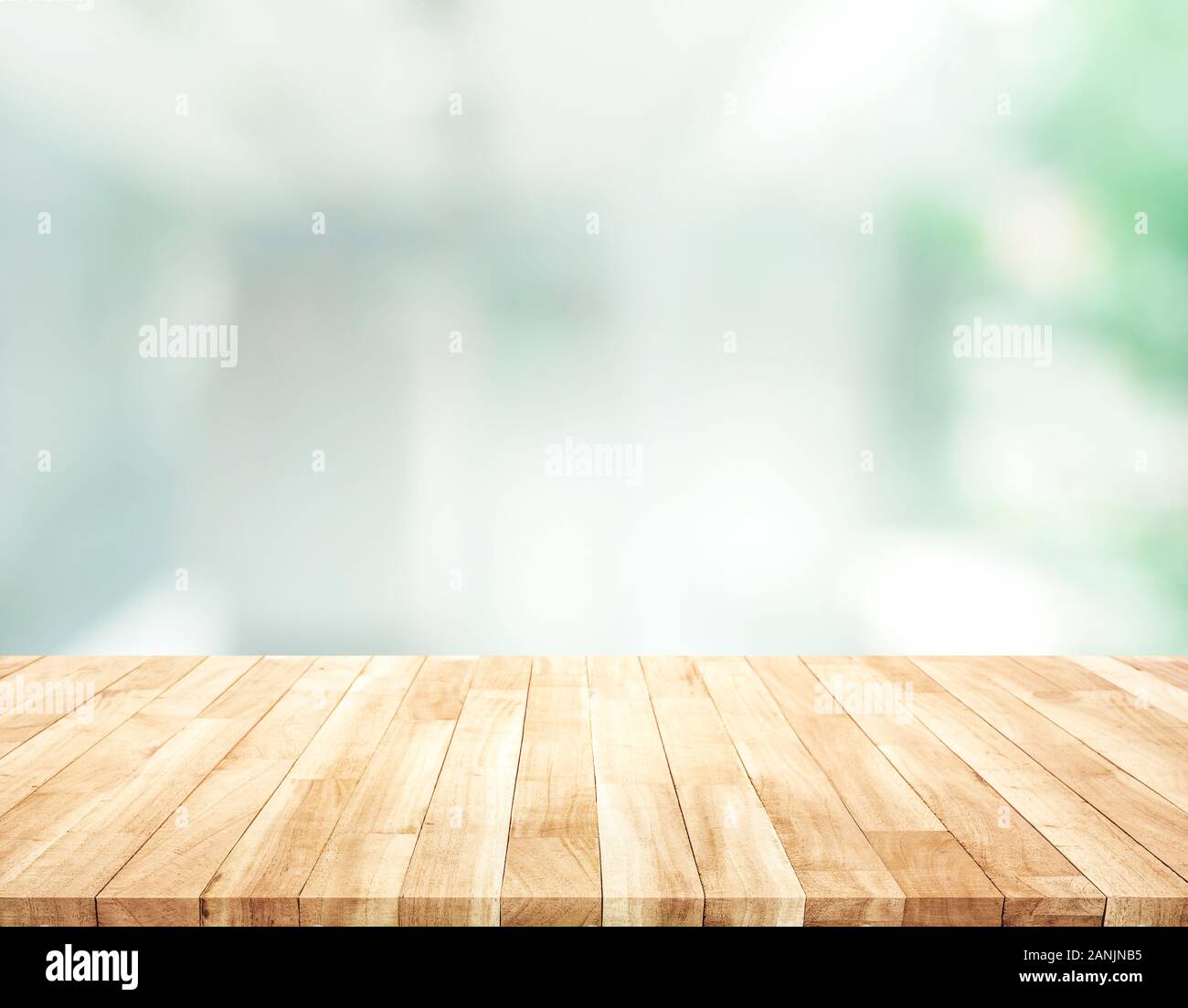 Empty wood table top on blur abstract modern room background Stock Photo