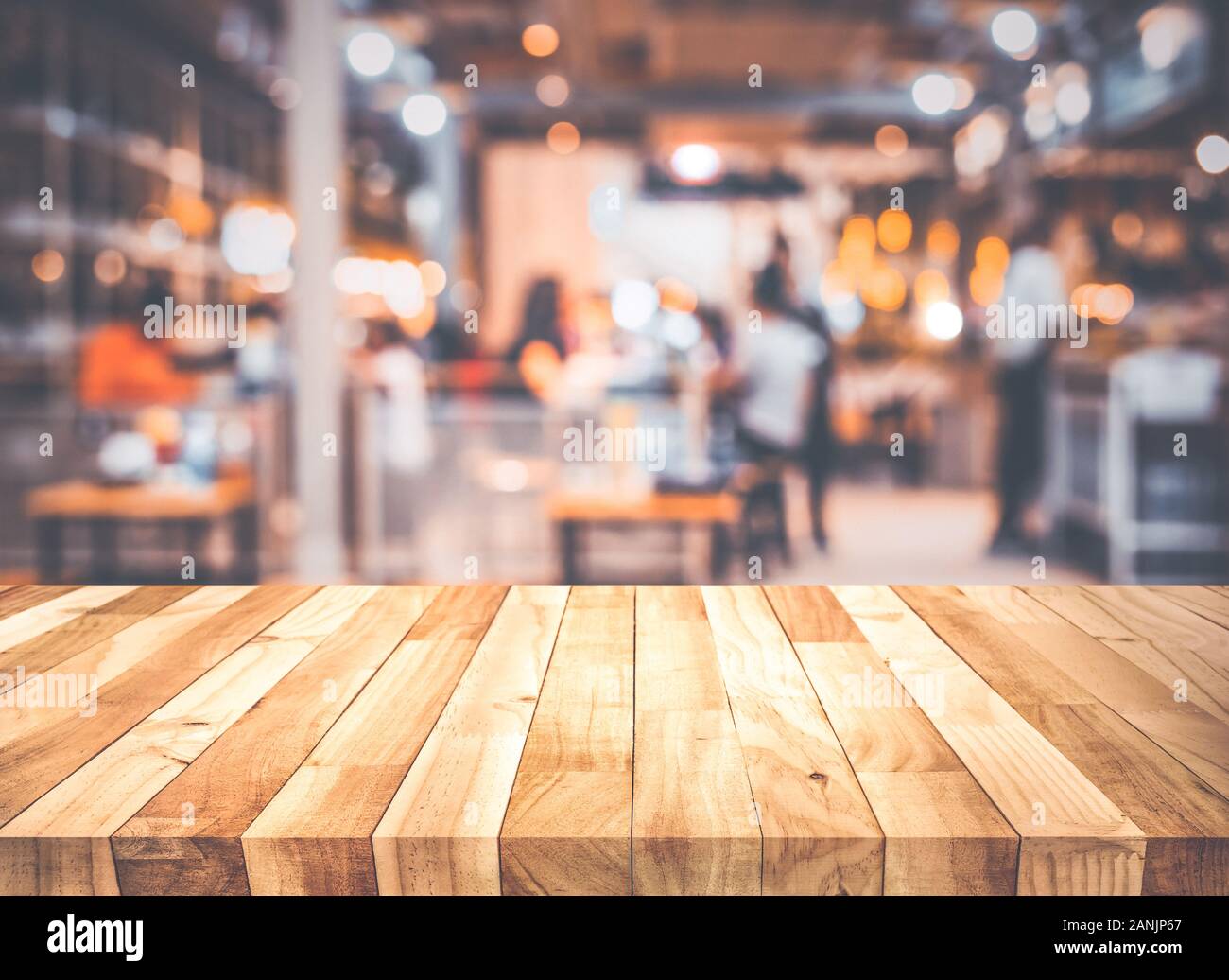 Empty wood table top on blur light bokeh in dark night cafe restaurant   montage product display or design key visual layout Stock  Photo - Alamy