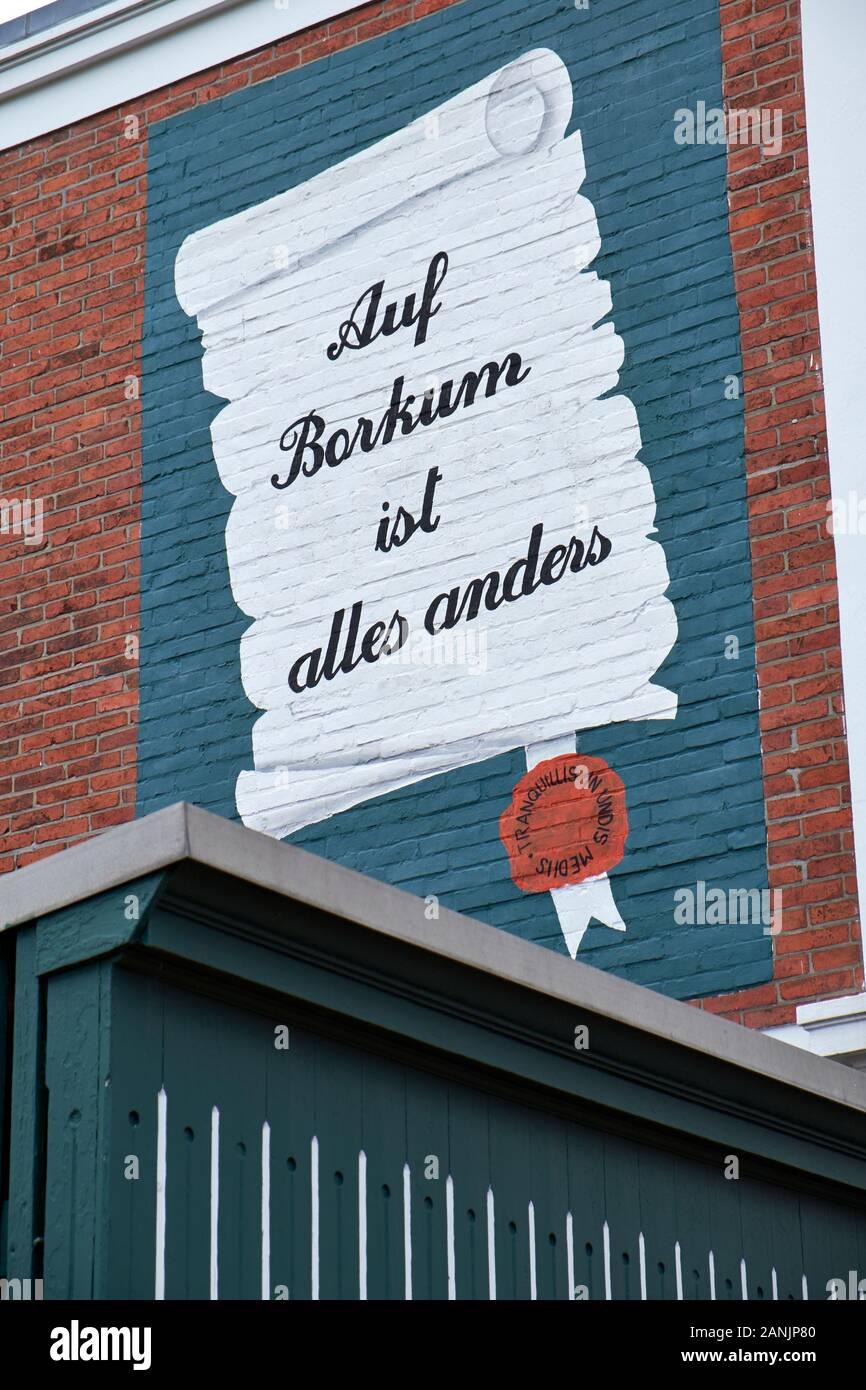 Wall mural in the German language meaning 'Everything's different on Borkum' Stock Photo