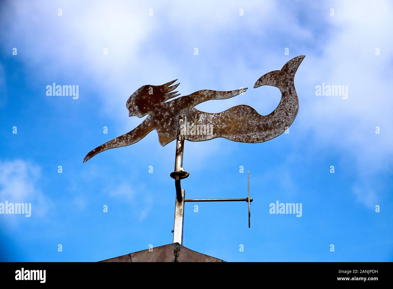 Weather vane in the form of a mermaid Stock Photo