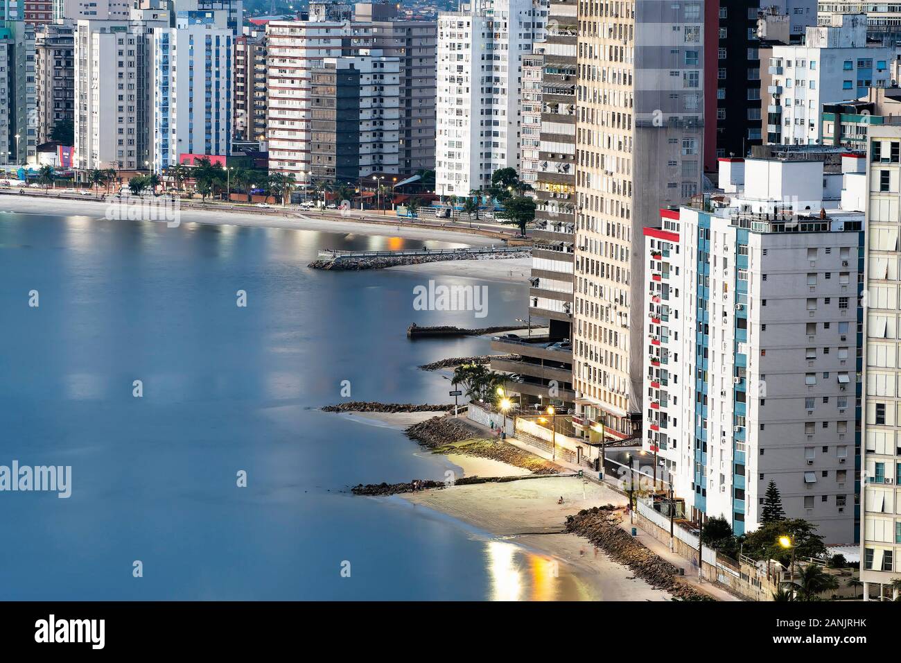 Sao Vicente - SP, Brazil - November 21, 2019: View of the buildings and beaches of Sao Vicente city, SP Brazil at dusk, when the lights of the city st Stock Photo