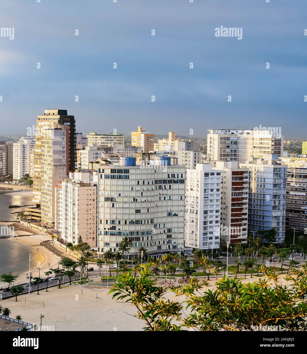 Coastal city with many tall buildings near to the beach. Aerial view of Sao Vicente city, SP Brazil. Paulista coast of Brazil. Stock Photo