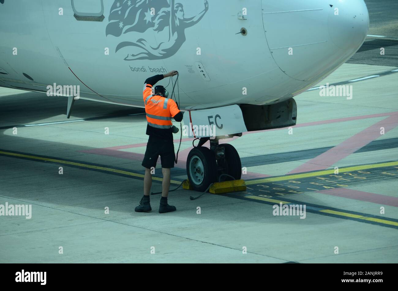 Passenger Jet on Airport apron, pre flight check Stock Photo