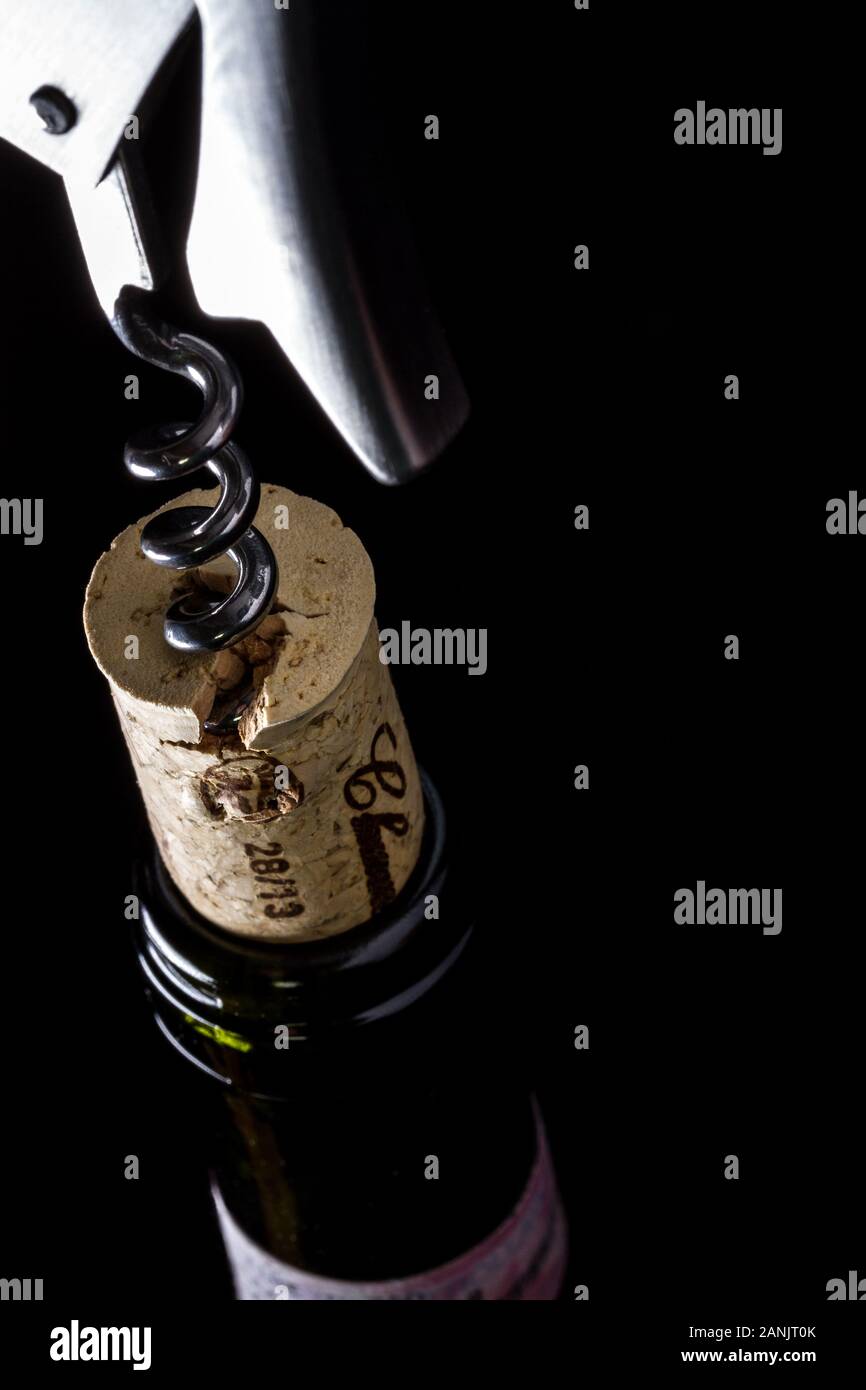 bottle opening with cork close up Stock Photo Alamy