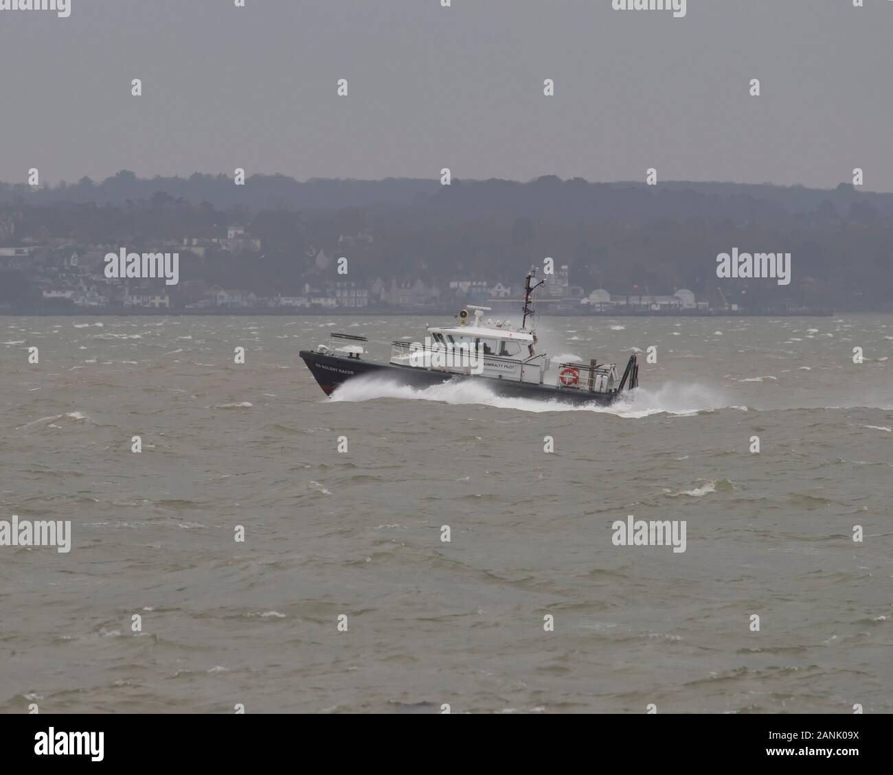 Admiralty Pilot Launch 'SD Solent Racer' battles through rough water in Spithead Stock Photo