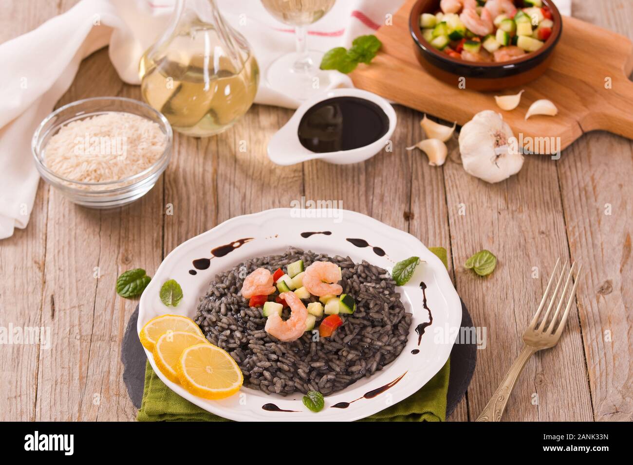 Squid ink risotto Stock Photo - Alamy