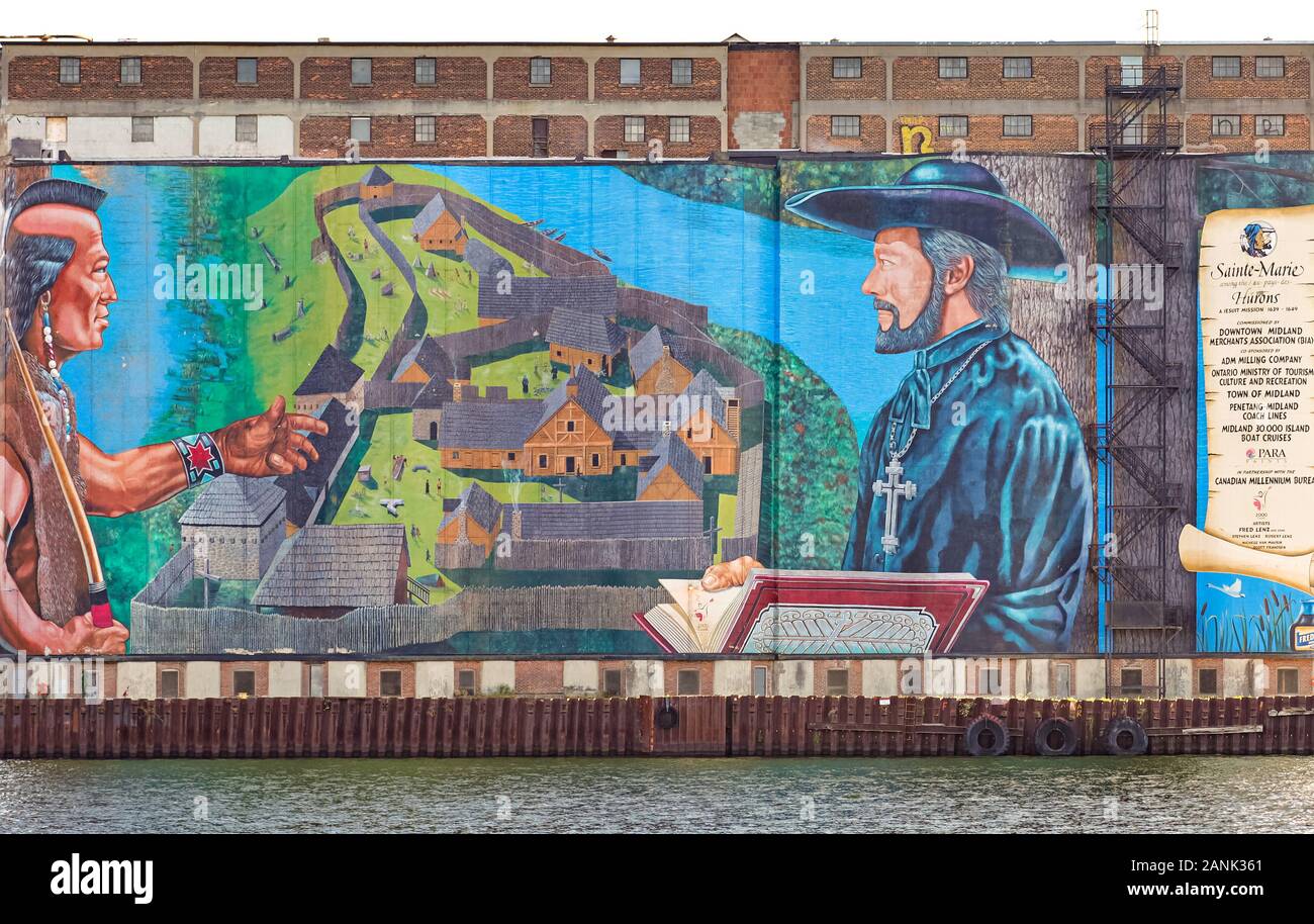 Large Mural with jesuit missionary meeting with the Huron Nation at Sainte-Marie among the Hurons by Fred Lenz & sons, in Midland Ontario Canada Stock Photo