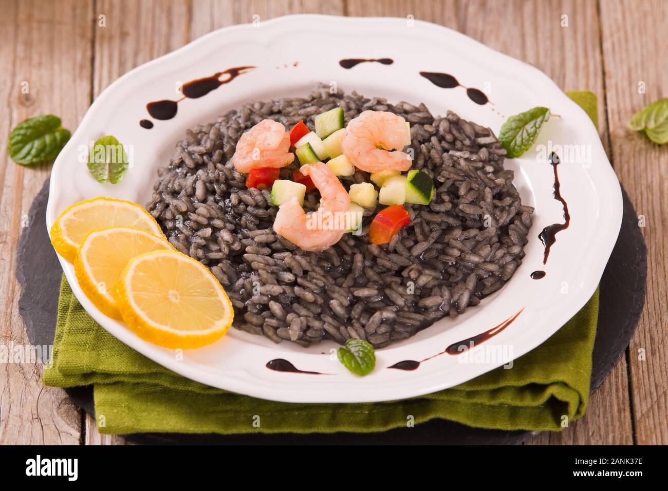 Squid ink risotto Stock Photo - Alamy