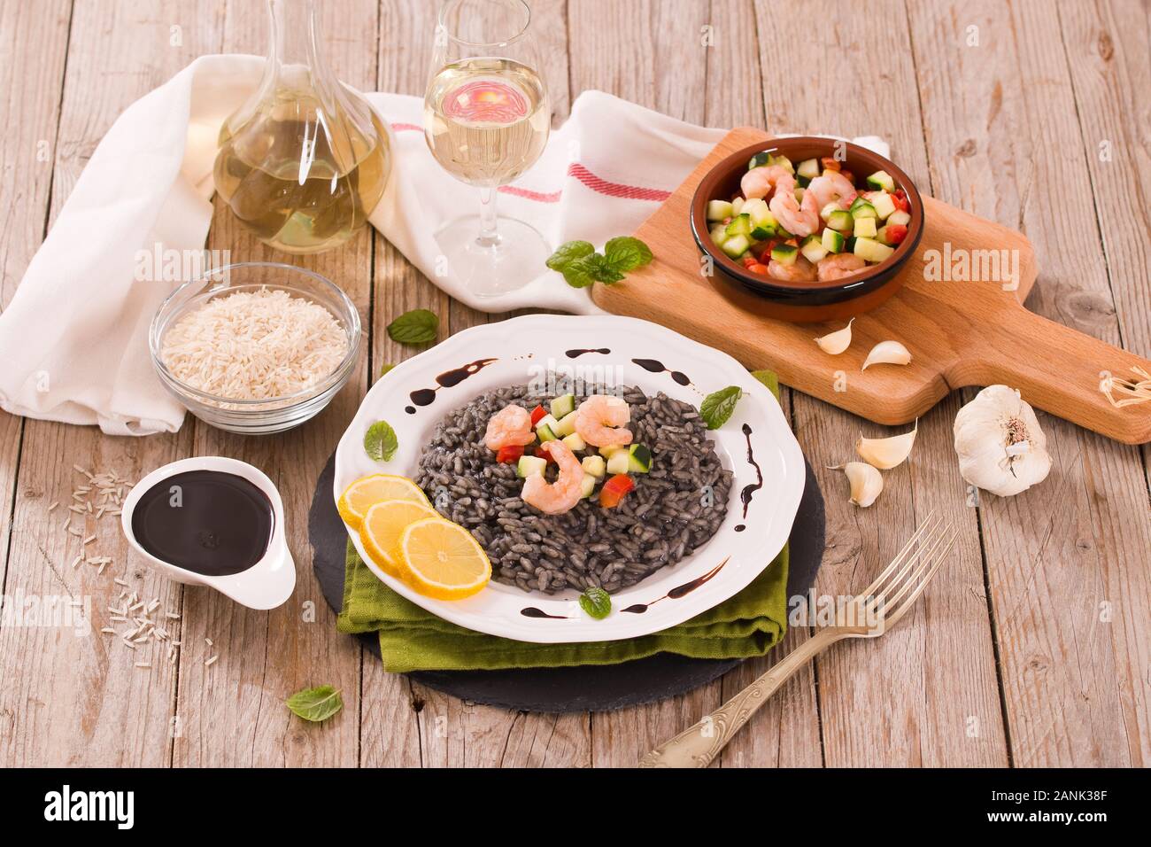 Squid ink risotto Stock Photo - Alamy