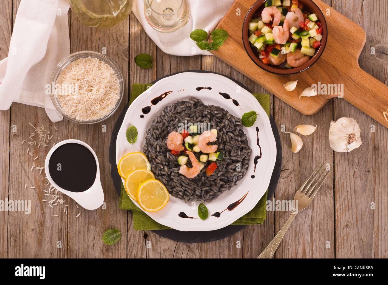 Squid ink risotto Stock Photo - Alamy
