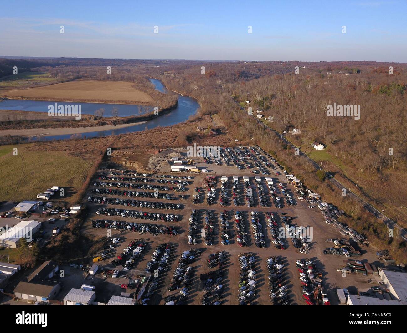 Drone aerial auto car junk yard near Great Miami River Ohio Stock Photo