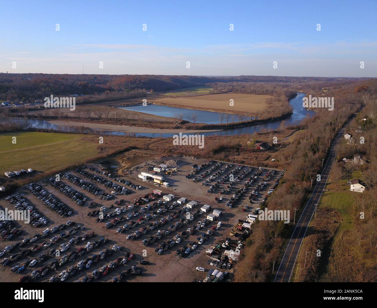 Drone aerial auto car junk yard near Great Miami River Ohio Stock Photo