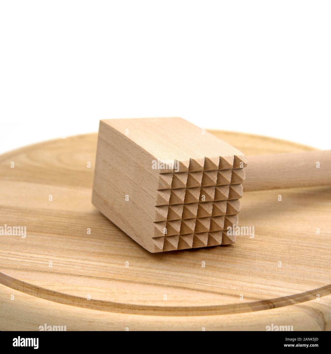 Meat tenderizer made of wood Stock Photo