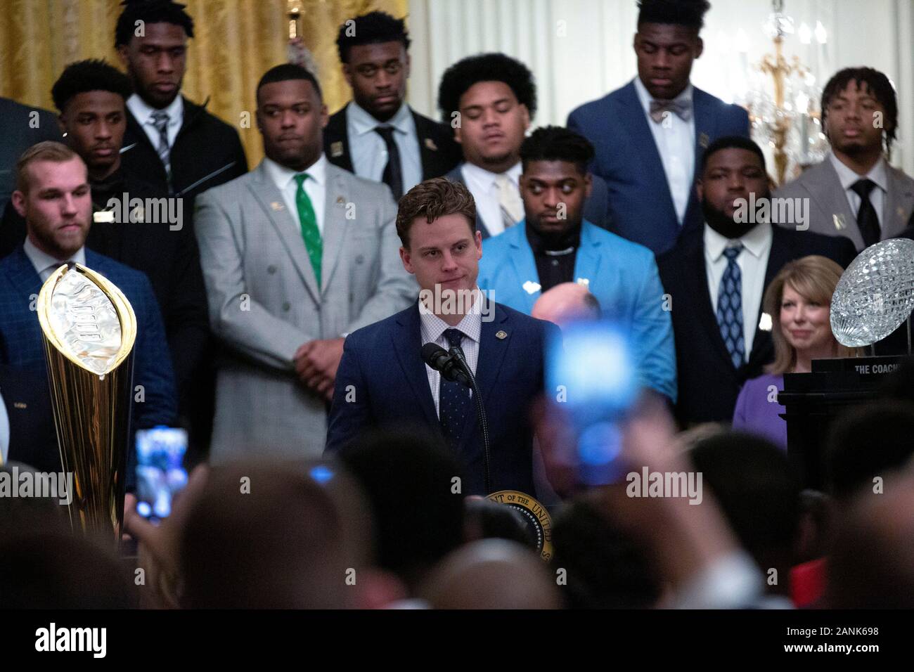 Joe Burrow, Louisiana State University quarterback, delivers remarks in the East Room of the White House in Washington D.C., U.S., as United States President Donald J. Trump hosts an event celebrating their championship win on Friday, January 17, 2020.  The Tigers were named 2019 College Football National Champions after defeating Clemson in the championship game on January 13, 2020. Credit: Stefani Reynolds / CNP | usage worldwide Stock Photo