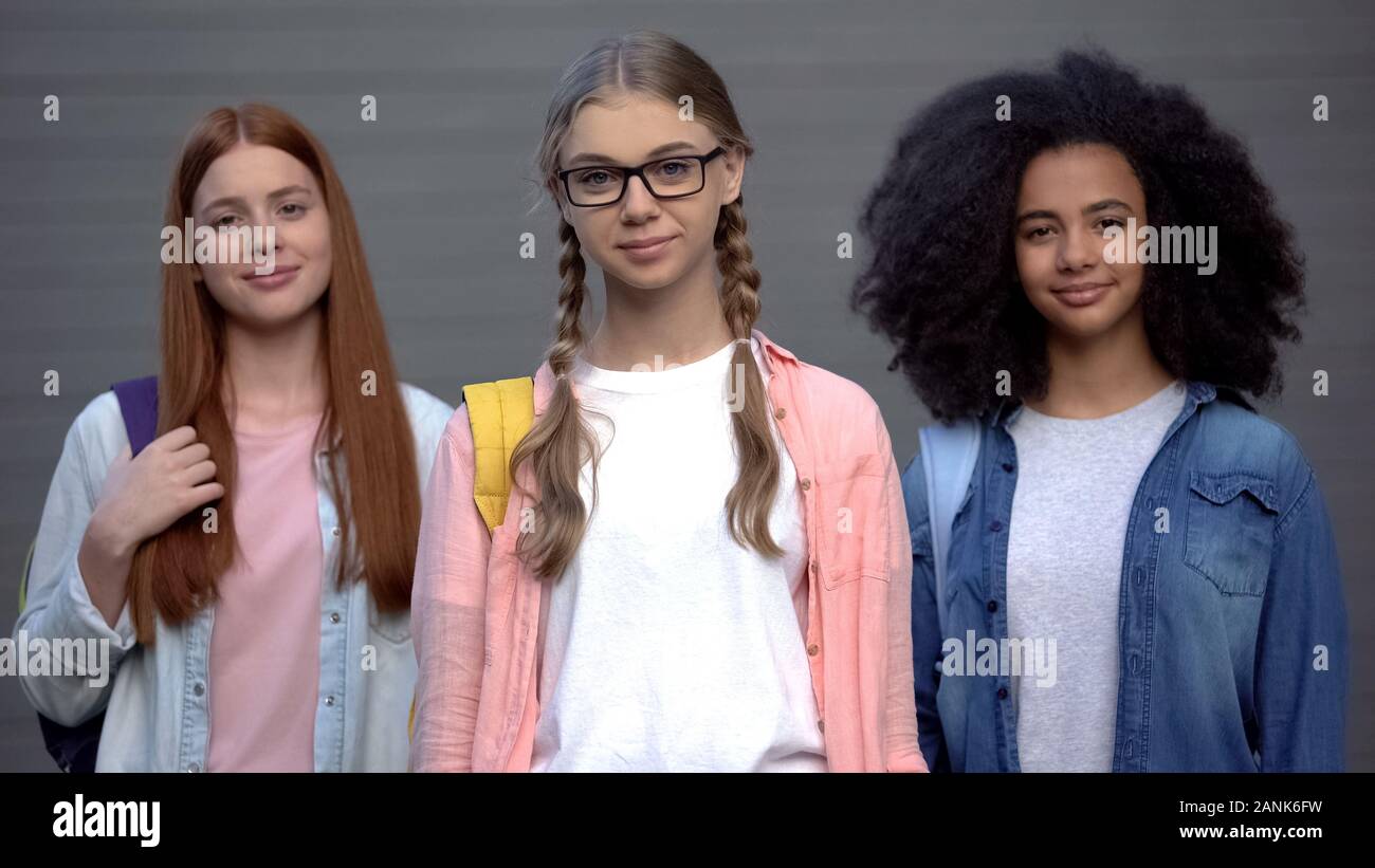 Happy students looking camera, multiracial educational project, university Stock Photo