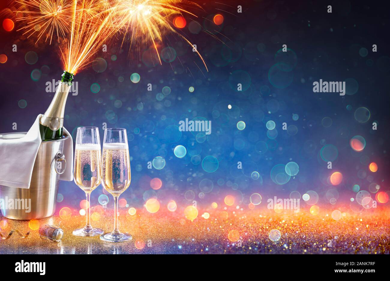 New Year Celebration With Champagne And Fireworks Popping In Bottle Color Trend 2020 Stock Photo