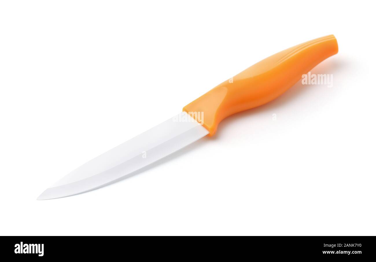 White blade ceramic kitchen knife isolated on white Stock Photo