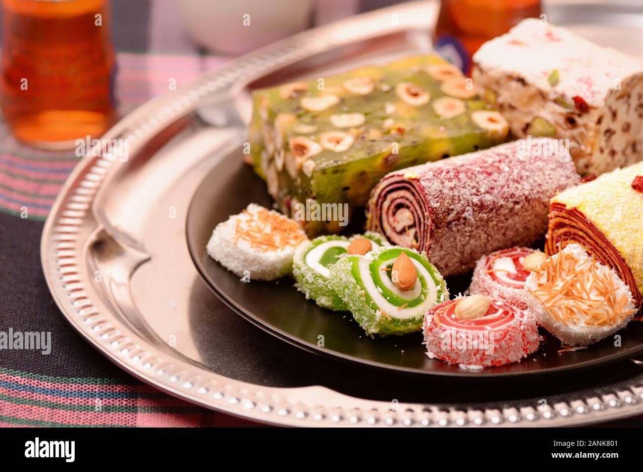Assorted traditional turkish delight and tea Stock Photo