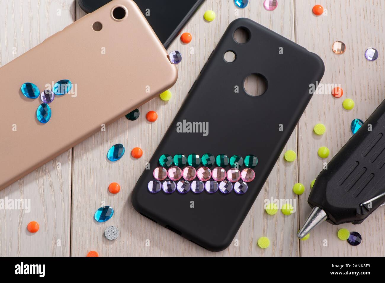 Mobile phone cases decorated with various rhinestones Stock Photo Alamy