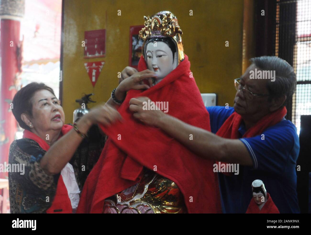 Jakarta, Indonesia. 17th Jan, 2020. Residents of Chinese descent bathe statues or images of gods and goddesses, and clean up various prayer equipment at the Amurva Bhumi Temple, Kasablanka area, Jakarta, on January, 17, 2020. The tradition that is carried out every year before the Chinese New Year is believed to add to the solemn and smooth procession of prayers performed by Chinese citizens. Credit: Dasril Roszandi/ZUMA Wire/ZUMAPRESS.com/Alamy Live News Stock Photo