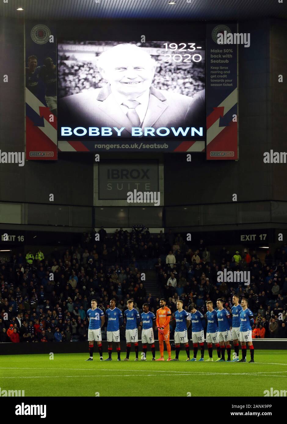 Rangers players stand for a minutes silence in memory of formaer player