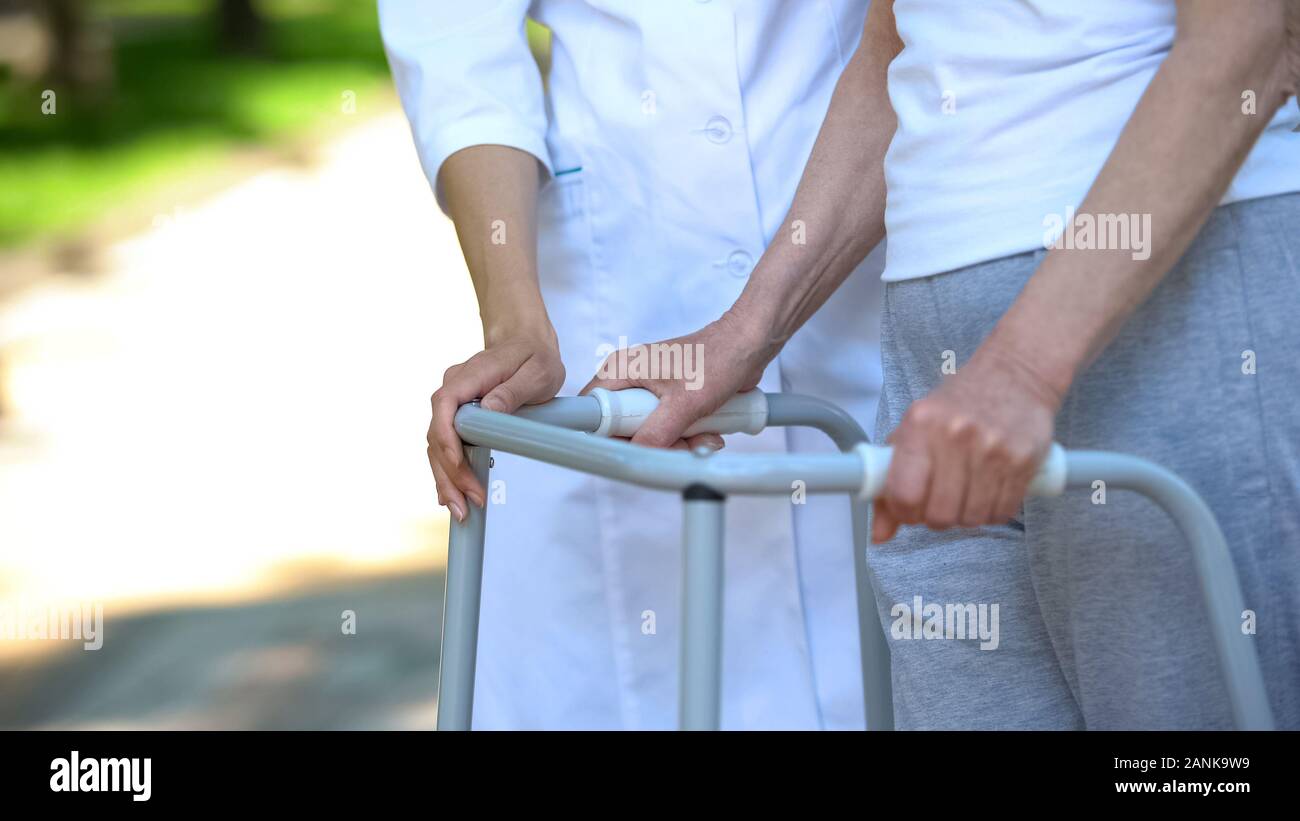 Old lady walking frame hi-res stock photography and images - Alamy