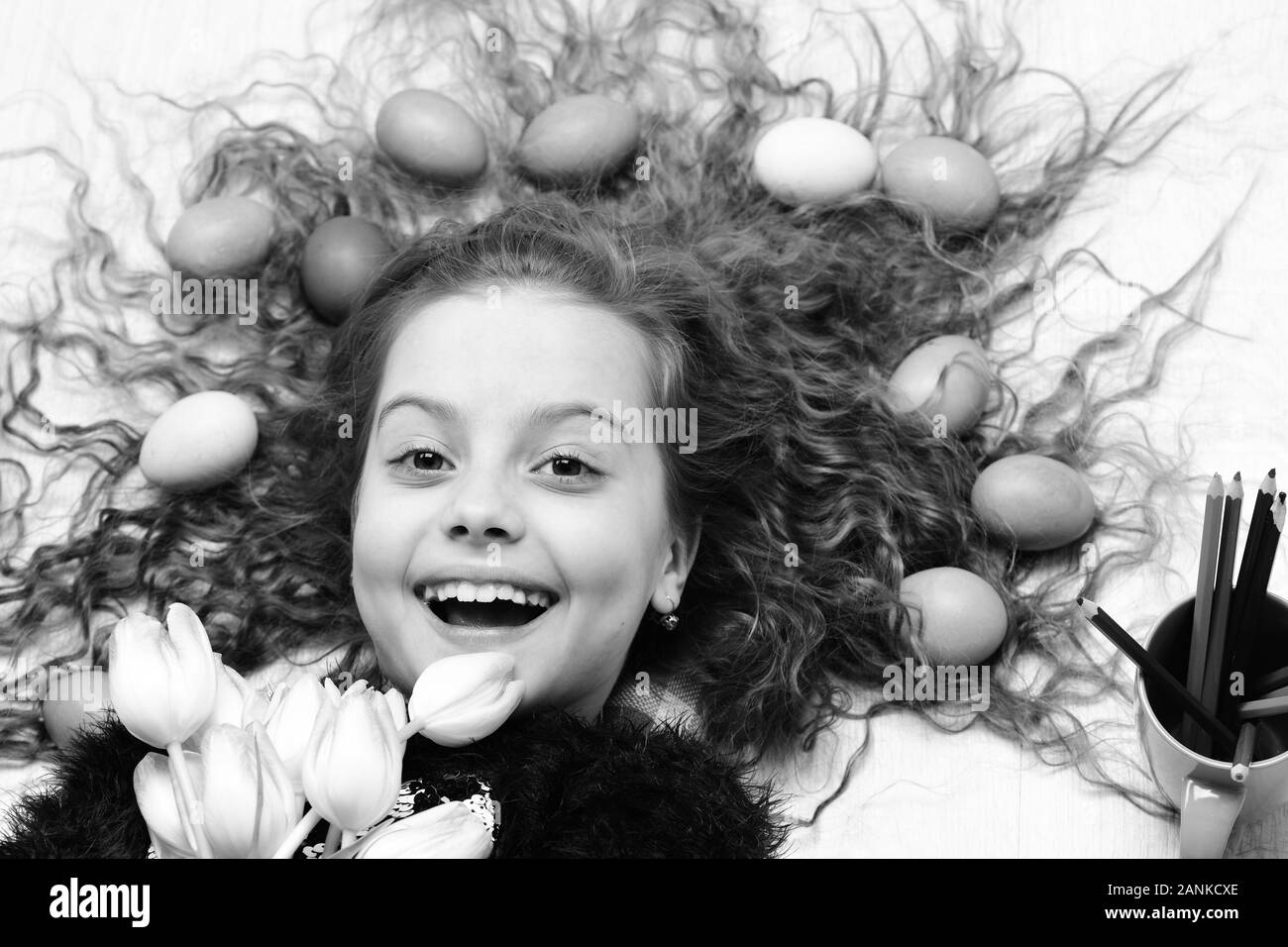 feelings and emotions, small child, happy girl with colorful easter