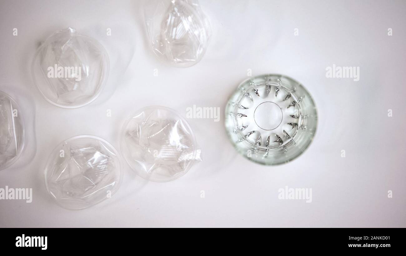 Difference between plastic cup and water glass, reusable drink material