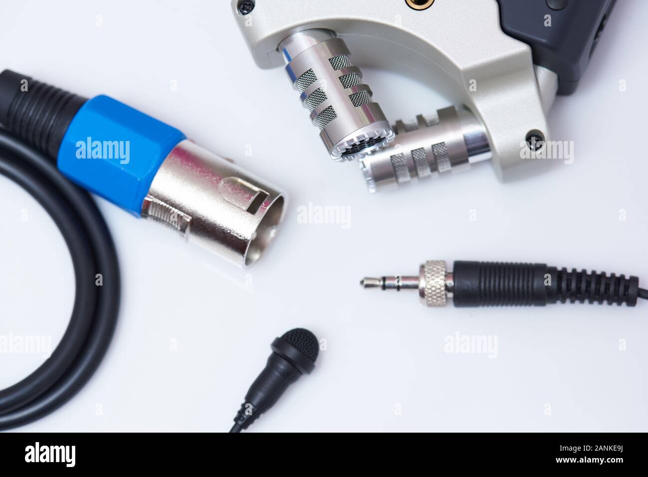 Different audio equipment on white background macro view Stock Photo