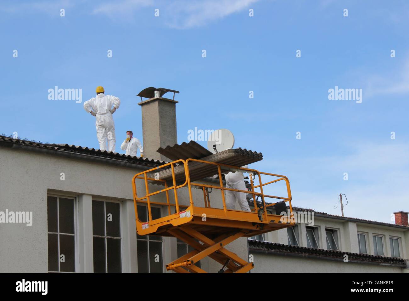 Repair work on a flat roof Stock Photo