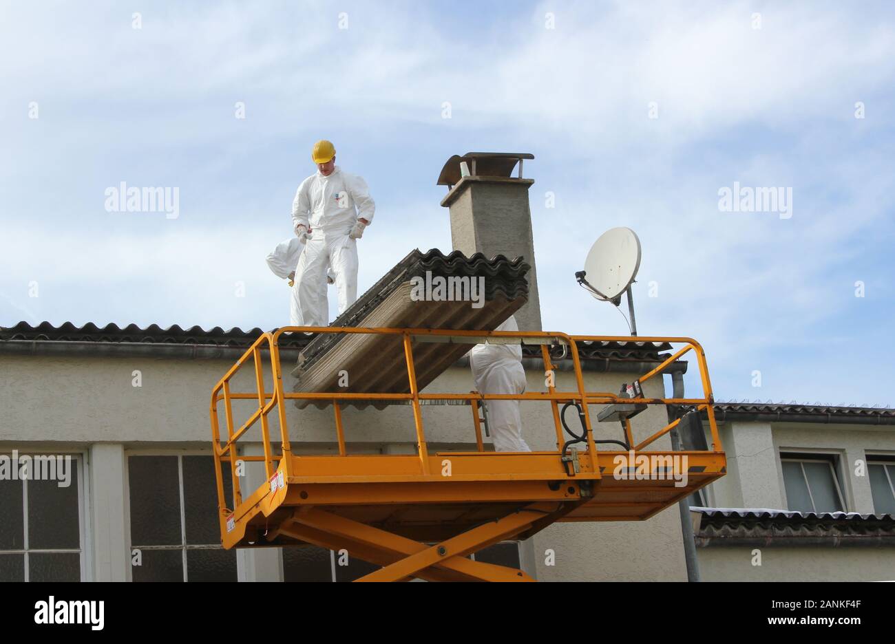 Repair work on a flat roof Stock Photo