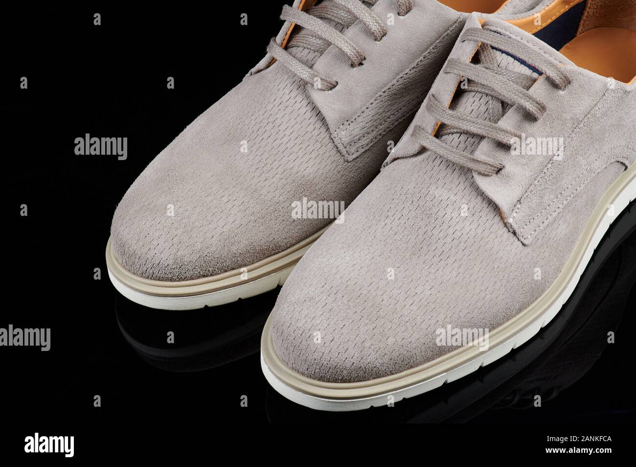 Gray man casual shoes isolated on black background Stock Photo
