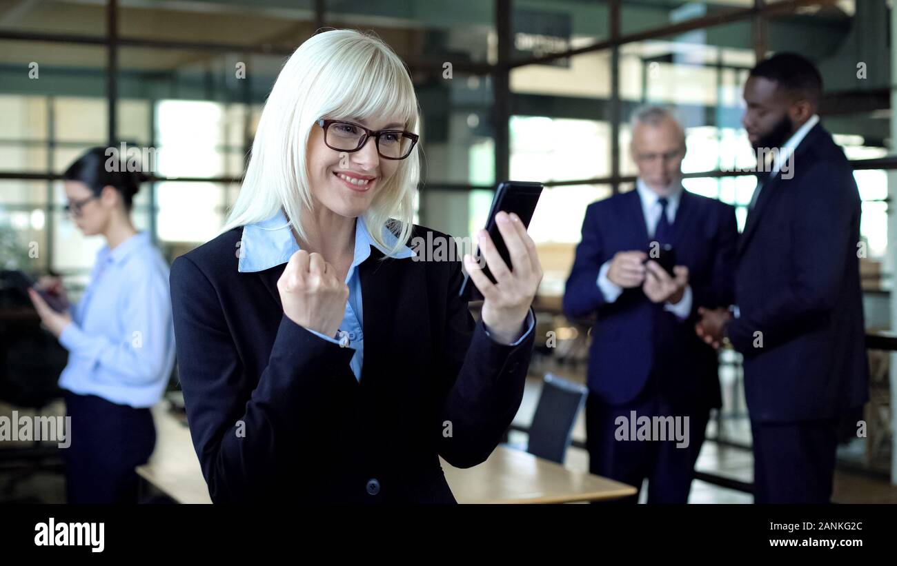 Excited business woman hi-res stock photography and images - Alamy