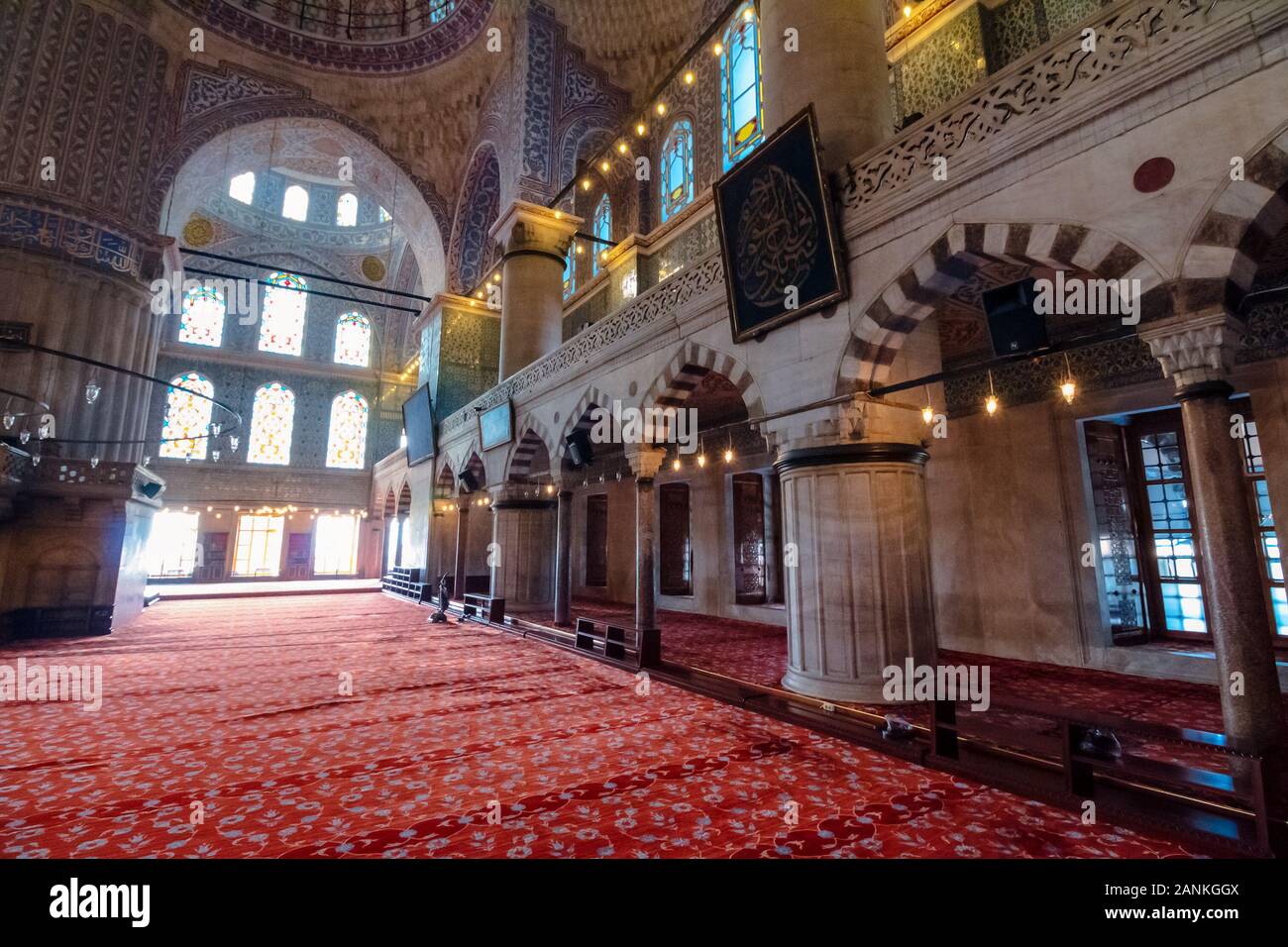istanbul, turkey - AUG 18, 2015: inside interior of blue mosque also known as sultan ahmed. functioning mosque is a popular travel destination Stock Photo