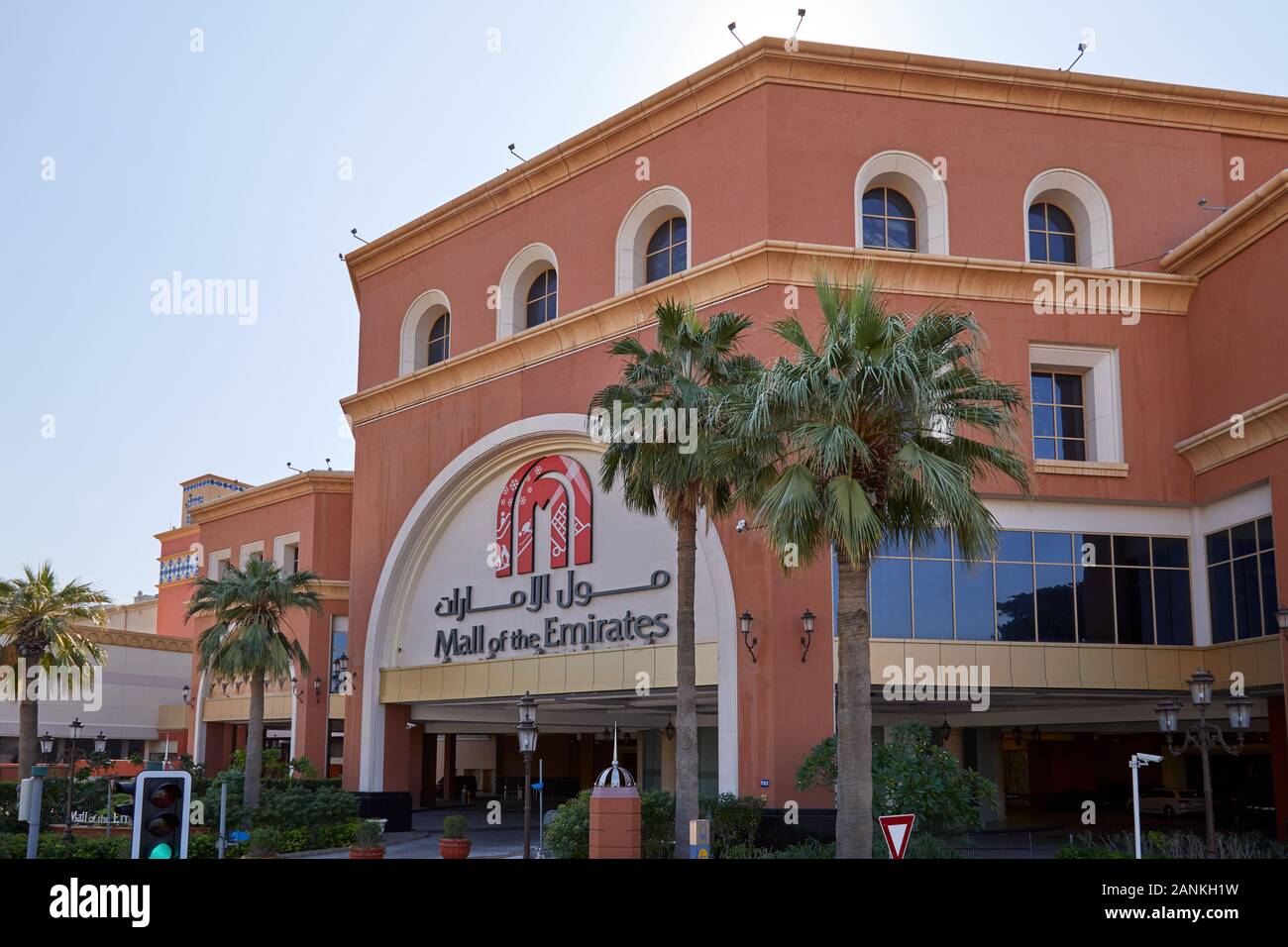 DUBAI, UNITED ARAB EMIRATES - NOVEMBER 22, 2019: Mall of the Emirates shopping center building with palm trees in a sunny day Stock Photo