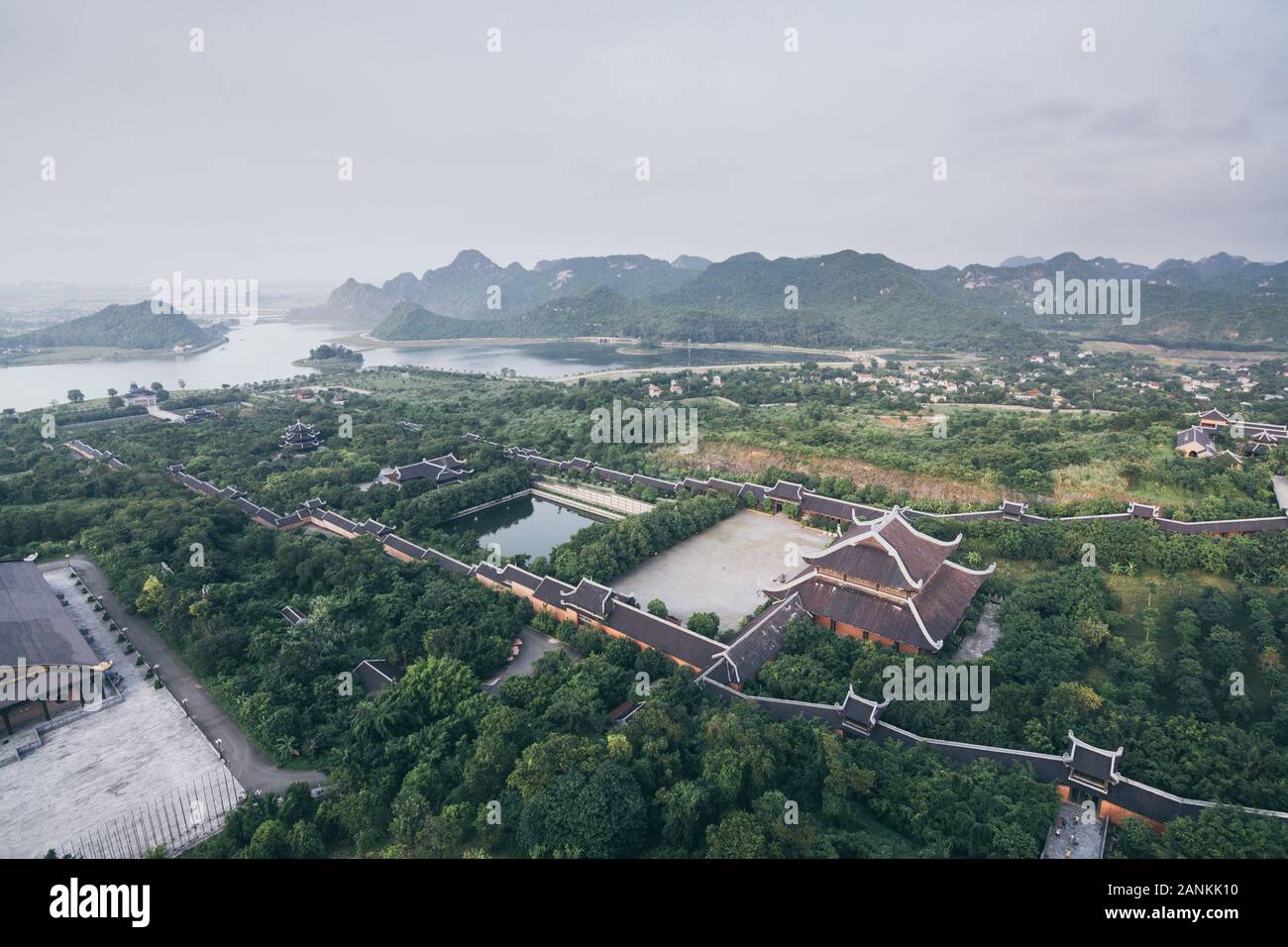 Ninh Binh, Vietnam - May 2019: aerial view from Bai Dinh stupa over Buddhist temple complex and mountains Stock Photo
