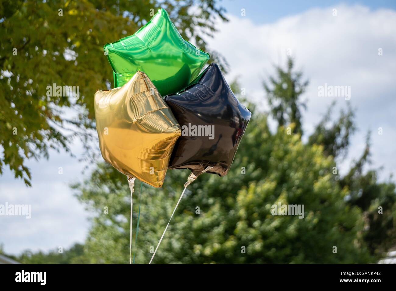 Jamaican themed balloons for a party outside Stock Photo Alamy