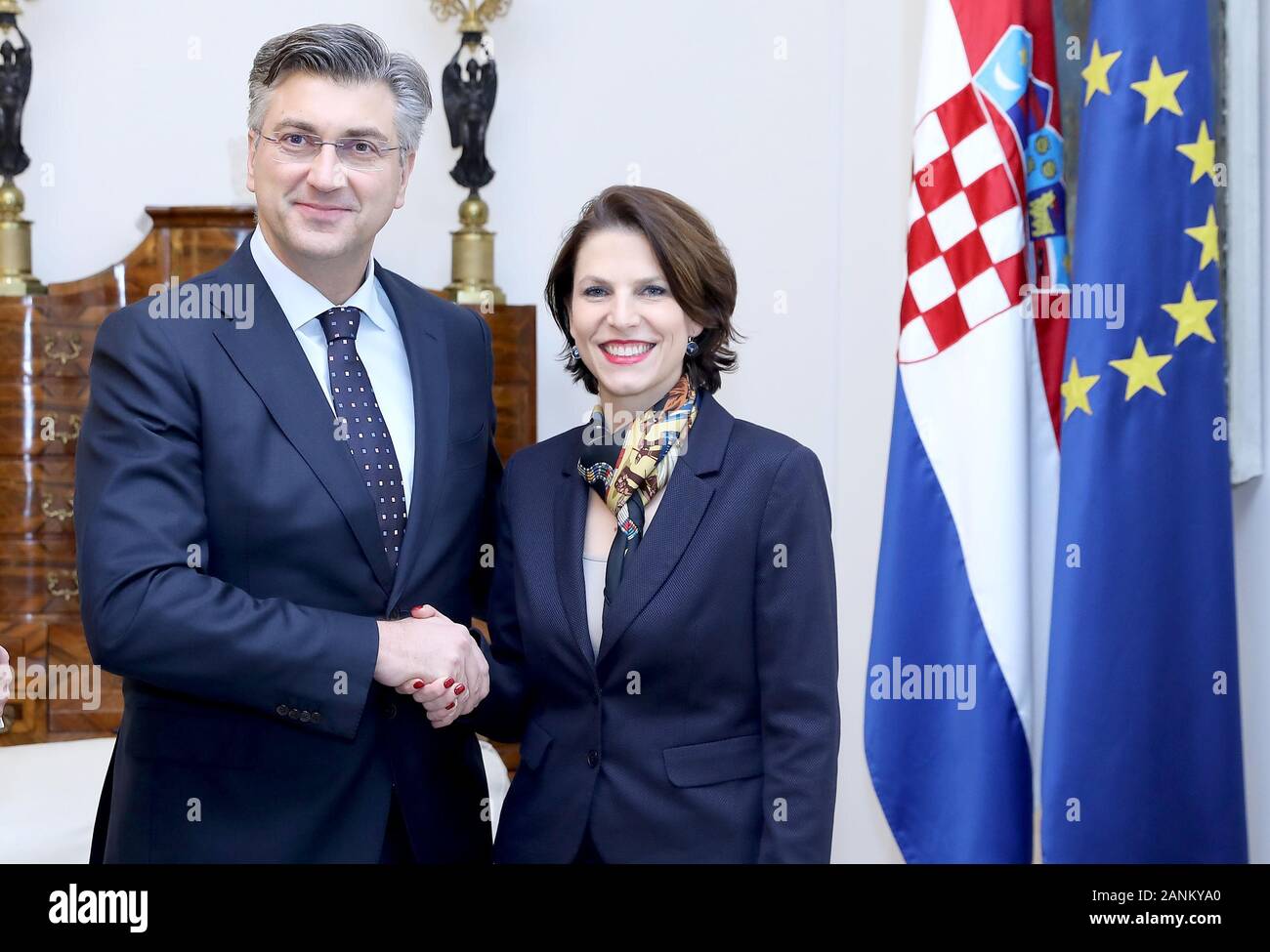 (200117) -- ZAGREB, Jan. 17, 2020 (Xinhua) -- Croatian Prime Minister Andrej Plenkovic (L) shakes hands with Austrian Federal Minister for European Affairs Karoline Edtstadler during their meeting in Zagreb, Croatia, on Jan. 17, 2020. Croatia and Austria will continue to push for a decision to open accession negotiations with Albania and North Macedonia at European Council level in March, Croatian Prime Minister Andrej Plenkovic and Austrian Federal Minister for European Affairs Karoline Edtstadler said here at a meeting on Friday. (Patrik Macek/Pixsell via Xinhua) Stock Photo