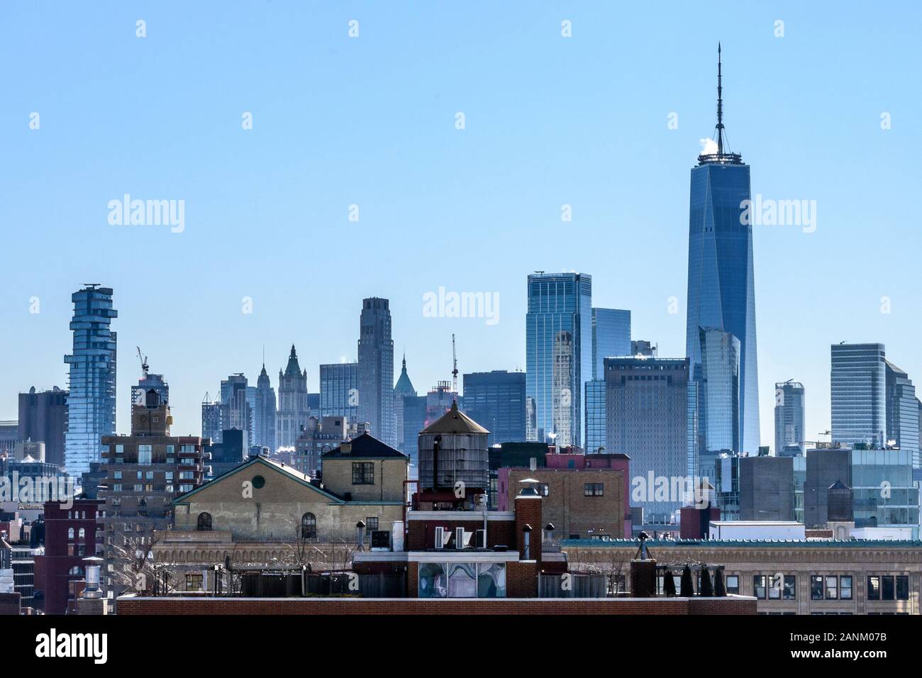 New York, USA, 17 January 2020. Lower Manhattan rooftops in front of the New York city skyline