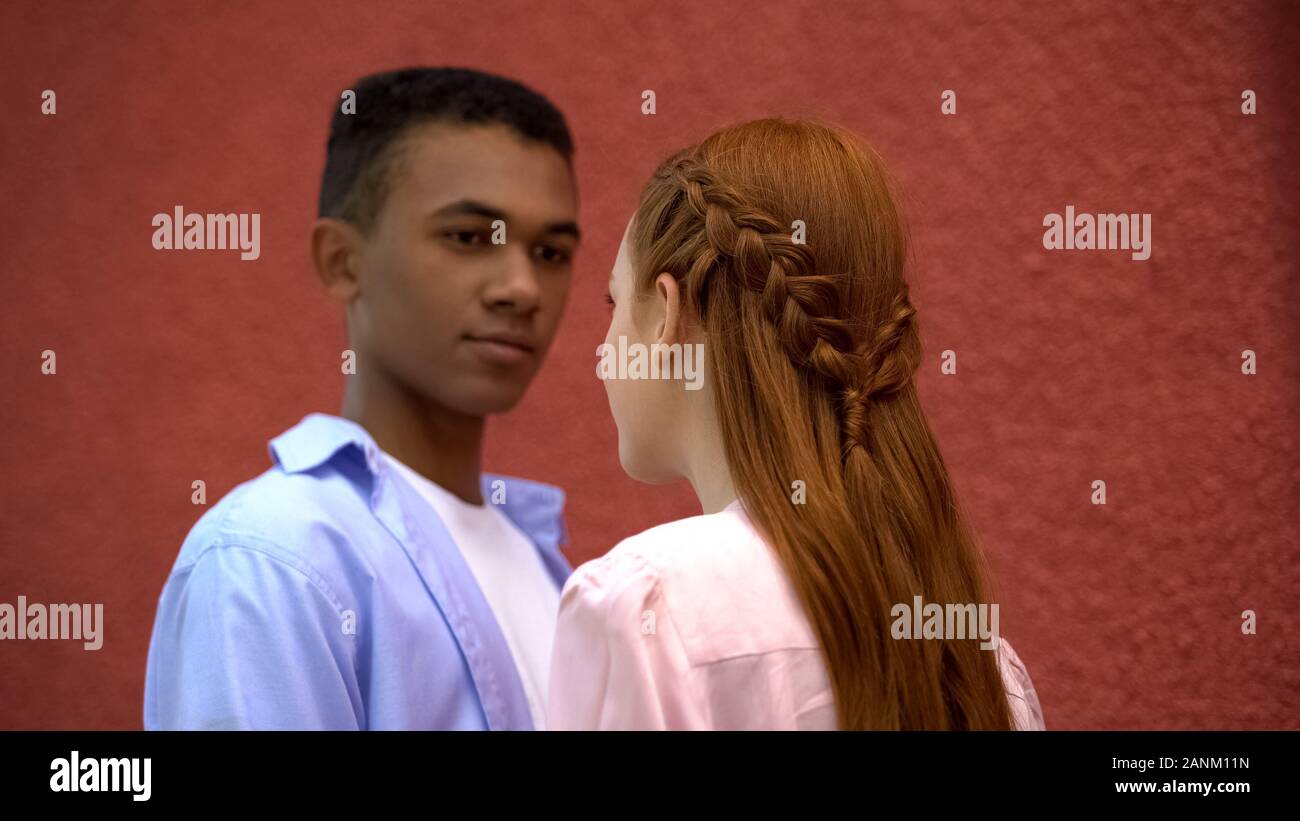 Teenagers Couple Looking At Each Other Beautiful Hairstyle Of Red